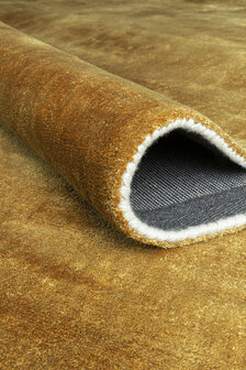 Effen vloerkleed Glow Ligne Pure kleur goud