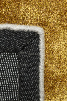 Effen vloerkleed Glow Ligne Pure kleur goud