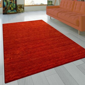 Effen terracotta wollen vloerkleed SIHRA 100