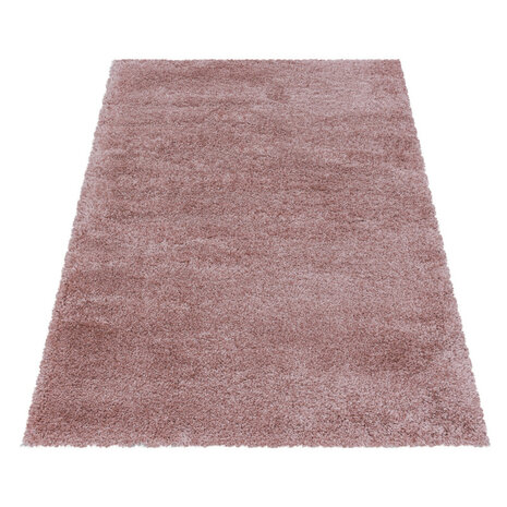 roze vloerkleed of karpet