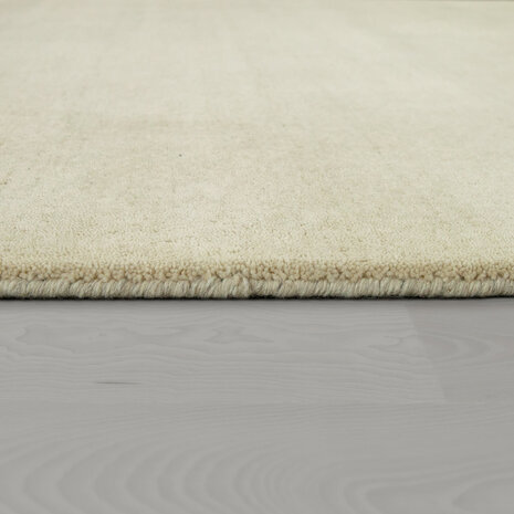 Effen creme wollen vloerkleed SIHRA 100